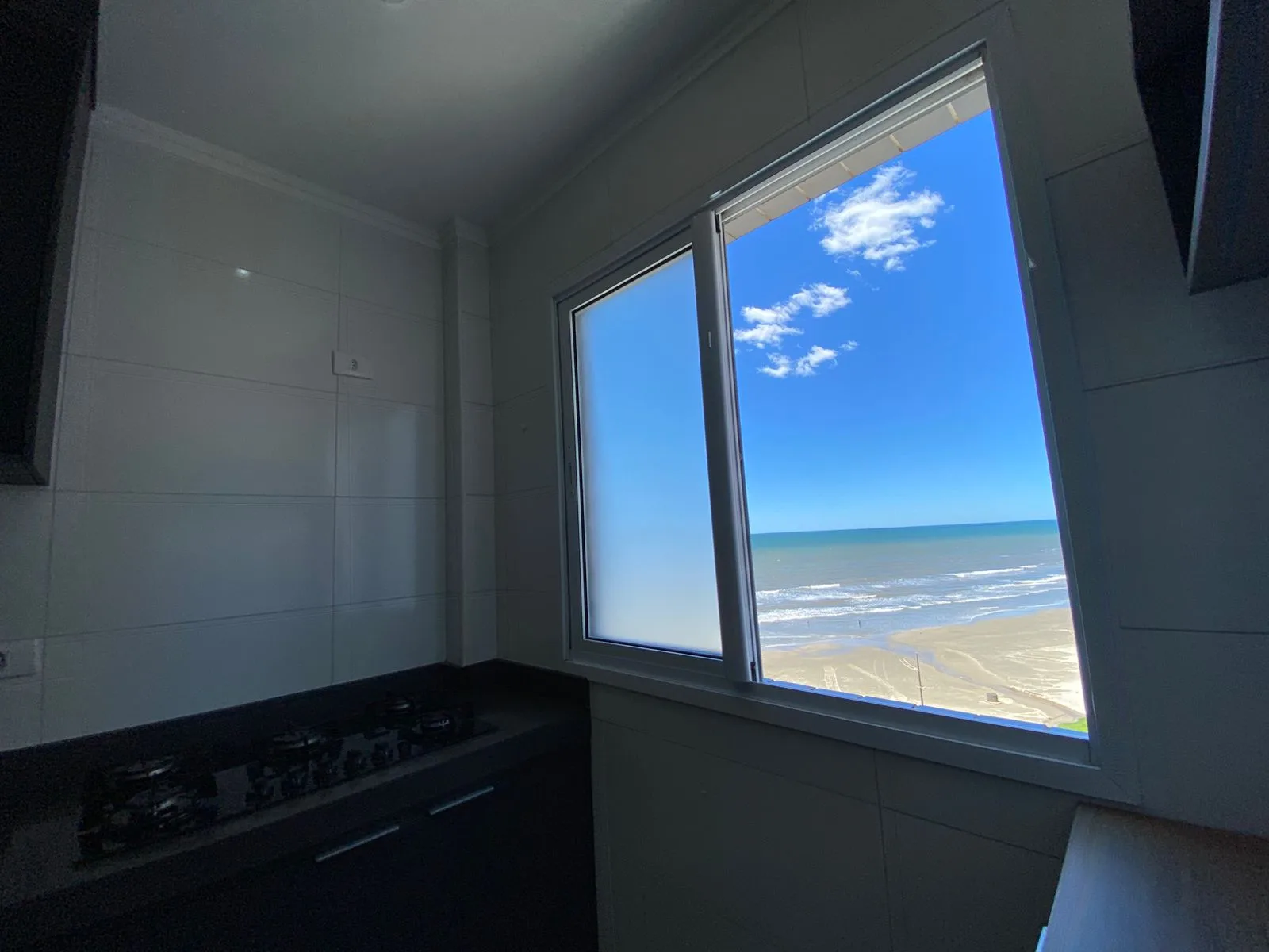 Apartamento frente mar Caiçara AT